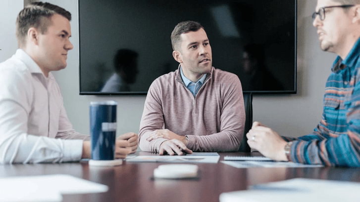 Advisors having a meeting